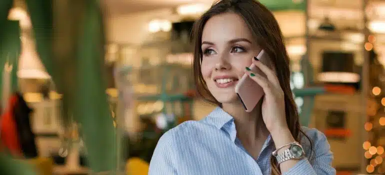 A woman making a phone call.
