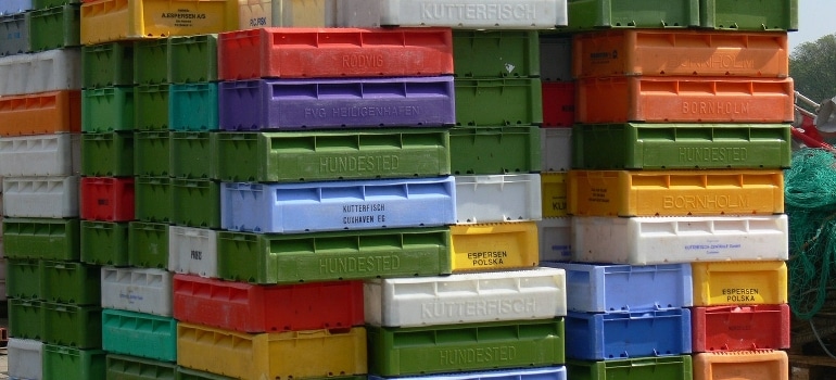 stack of plastic boxes