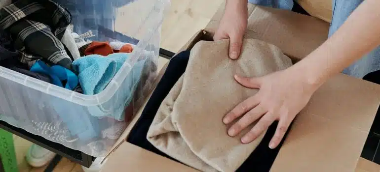 people preparing for the relocation, packing