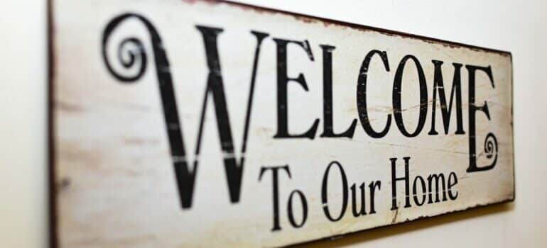 Welcome sign is one of gift ideas for new homeowners