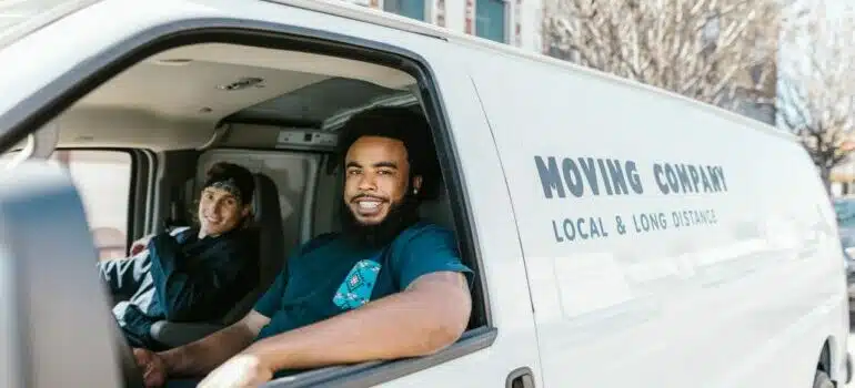 Hired movers to avoid downsides of friends helping you pack.