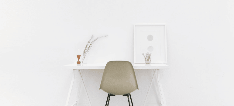 white wall and a chair