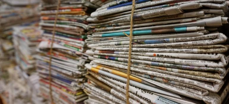 piled newspapers