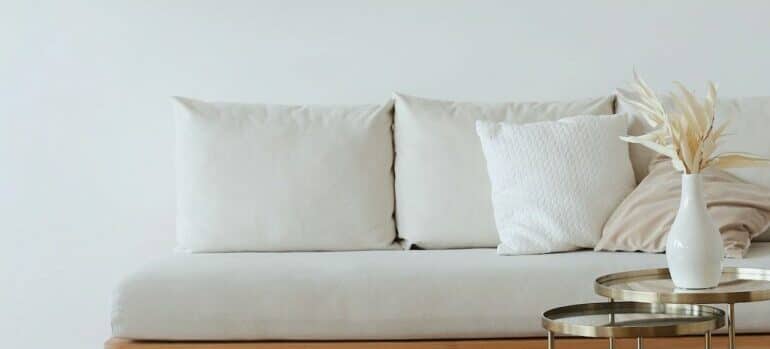 couch in front on a white wall