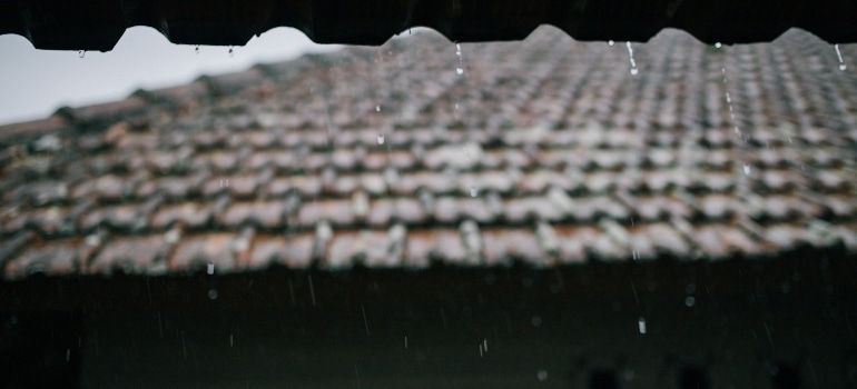 Rain on damaged roof that can't prevent flood damage in your storage unit