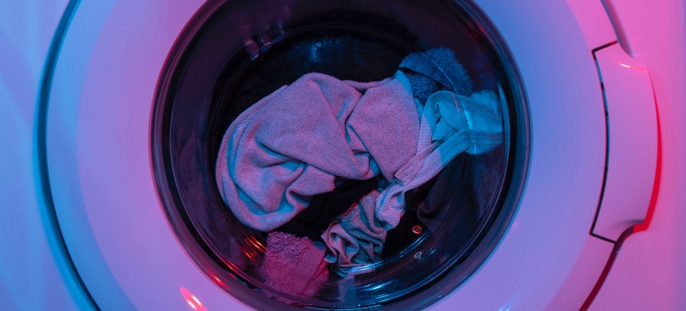 Clothes are being washed in a washing machine