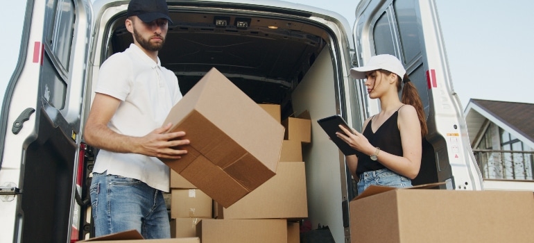 A woman hiring packers to minimize packing waste